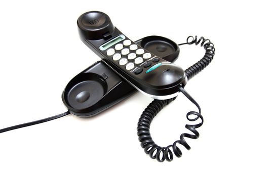 One black phone with buttons on a white background