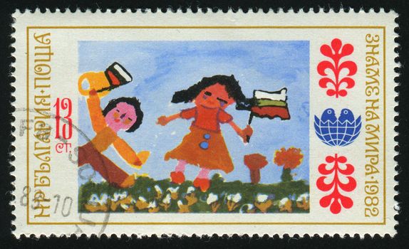 BULGARIA - CIRCA 1982: Children's drawings. A cute cartoon couple, circa 1982.