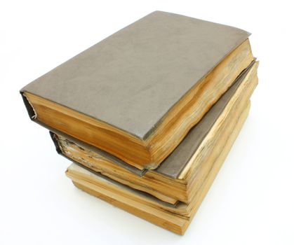 Pile from old mouldy books on a white background
