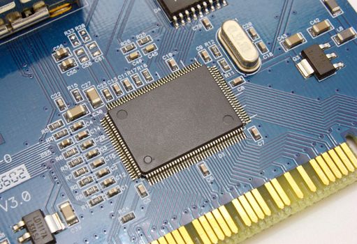 The electronic scheme of the motherboard on a yellow background from radio details
