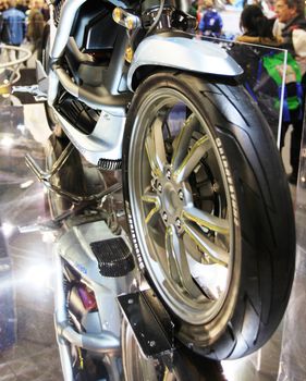 Details of motorcycles in exhibition at EICMA, International Motorcycle Exhibition in Milan, Italy.