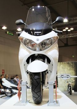 Details of motorcycles in exhibition at EICMA, International Motorcycle Exhibition in Milan, Italy.