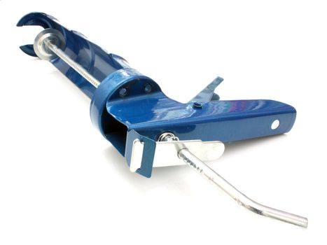 Building pistol for hermetic metal dark blue color on a white background