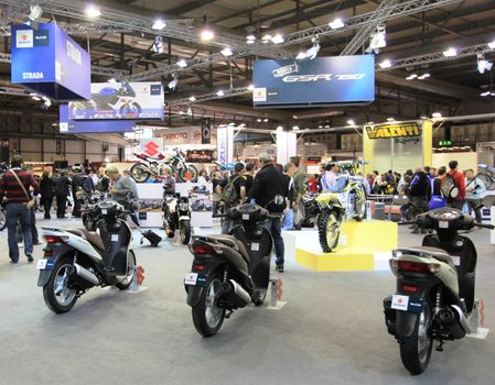 Details of motorcycles in exhibition at EICMA, International Motorcycle Exhibition in Milan, Italy.