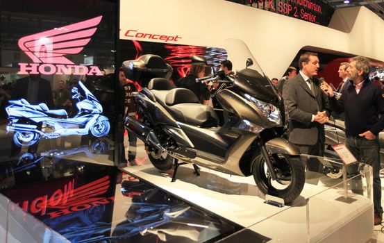 People visit Honda motorcycles area at EICMA, International Motorcycle Exhibition in Milan, Italy.