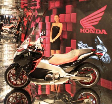 Close up of products presentation at Honda motorcycles area at EICMA, International Motorcycle Exhibition in Milan, Italy.