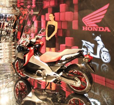 Close up of products presentation at Honda motorcycles area at EICMA, International Motorcycle Exhibition in Milan, Italy.