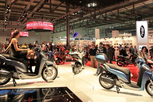 Close up of products presentation at Honda motorcycles area at EICMA, International Motorcycle Exhibition in Milan, Italy.