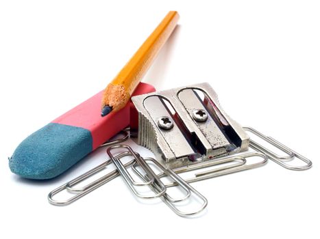 shot of eraser, pencil and pencil metal double sharpener on a white background