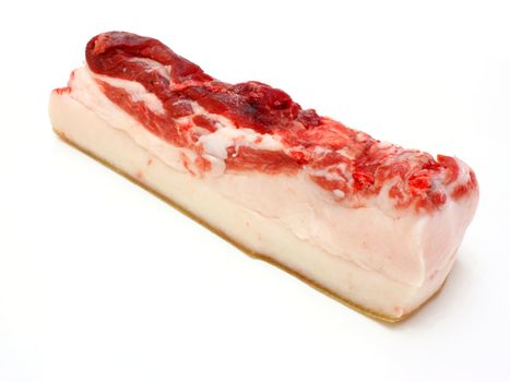 The big piece of fresh fat with a meat layer on a white background