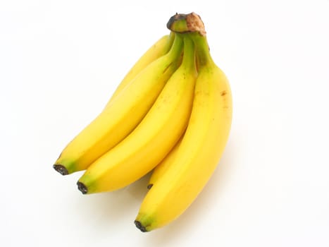 Yellow bananas apples and pears a still-life on a white background