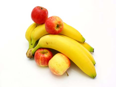 Yellow bananas apples and pears a still-life on a white background