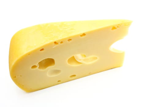 A piece of Swiss cheese isolated on white yellow delicatessen;