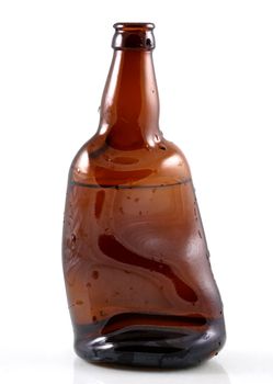 Curve brown bottle on a white background