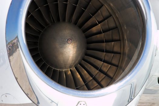 Close up of the fan blades inside a jet engine