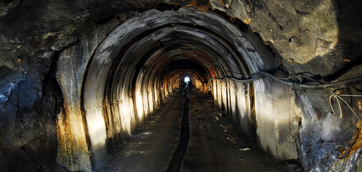 Light at the end of a tunnel of a mine