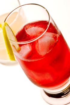 drink series: red cocktail with ice and lemon