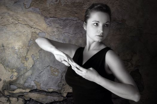 Portrait of the beautiful woman in studio