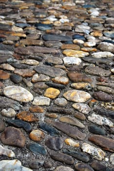 Abstract background of old medieval cobblestone pavement