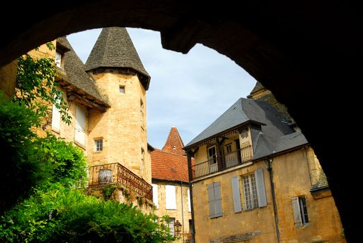 View from the arch in medieval town of Sarlat, France