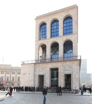 Entering the new Museo del Novecento, hosting Picasso, Cezanne, Fontana, Mondrian works of art in Milan, Italy