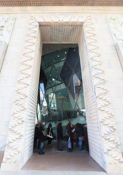 Entering the new Museo del Novecento, hosting Picasso, Cezanne, Fontana, Mondrian works of art in Milan, Italy