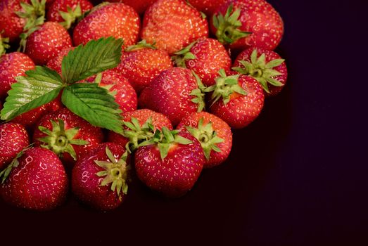 Strawberries on a black background