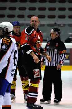 ZELL AM SEE, AUSTRIA - MARCH 19: Salzburg hockey League. Fight between Markus Ralser and Salzburg player. Game SV Schuettdorf vs Salzburg Sued  (Result 10-4) on March 19, 2011, at the hockey rink of Zell am See.