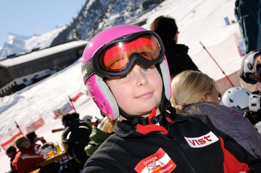 KAPRUN AUSTRIA - MARCH 5: Maiskogel Fanlauf 2011. Unidentified girl after race at charity ski race with many celebrities in austria on March 5, 2011 at the Maiskogel in Kaprun, Austria