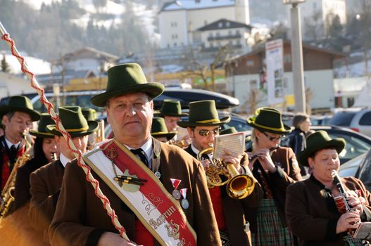 KAPRUN AUSTRIA - MARCH 5: Maiskogel Fanlauf 2011. Traditional concert band at charity ski race with many celebrities in austria on March 5, 2011 at the Maiskogel in Kaprun, Austria