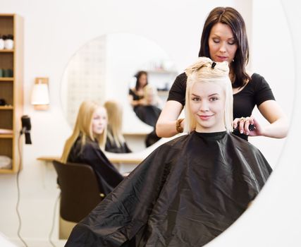 Young Blond Girl in the Hair Salon