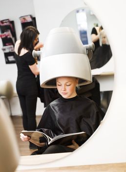 Young girl waiting at the Beauty Spa