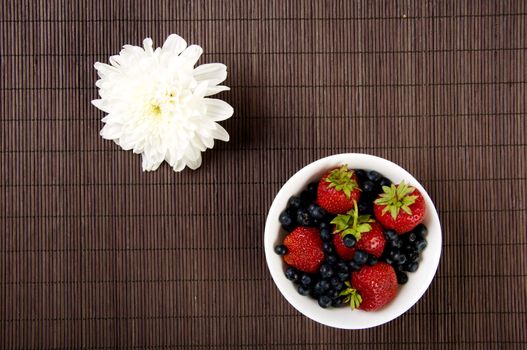 light Breakfast: Berries on a bamboo table