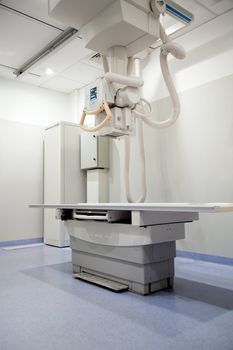 An x-ray table in a hospital in a clean sterile environment