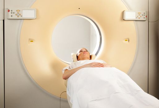 A woman having a CT Scan taken