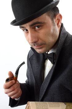 Portrait of a man with a tobacco pipe and hat bowler