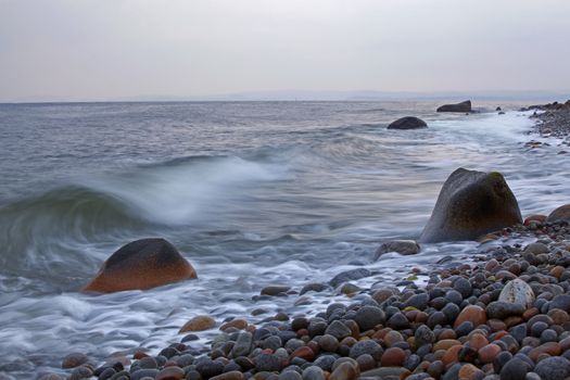 Evening picture of the rolling stones and water at Moelen