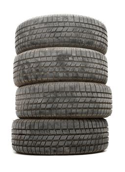 A pile of winter tyres on white background