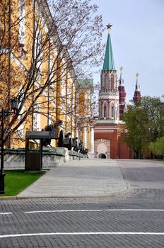 Historic cannon and balls in front of a church at the Kremlin.