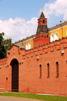 Moscow Kremlin architecture, red brick wall and tower in Aleksandrovsky garden