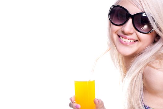 beautiful women in swimsuit with a glass of juice on a white background isolated