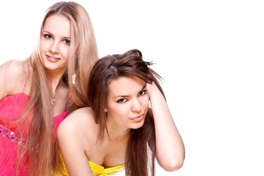 two beautiful women in a colored dress on a white background isolated