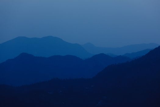 Mountains (Himalayas) after sunset. With copyspace. Shimla, Himachal Pradesh, India