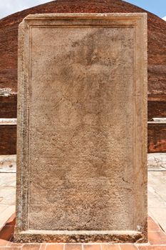 Stone tablet with inscriptions at Jetavaranama dagoba  (stupa). Anuradhapura, Sri Lanka