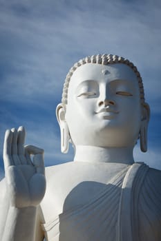Closse up of white Buddha statue. Mihintale, Sri Lanka
