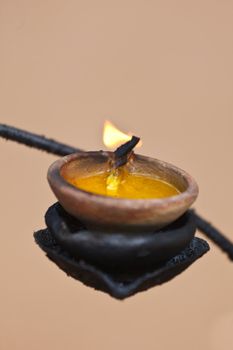 Burning lampion in Buddhist temple. Sri Lanka