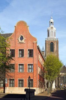 Architectural detail - part of town hall with Dutch gable and old church in background