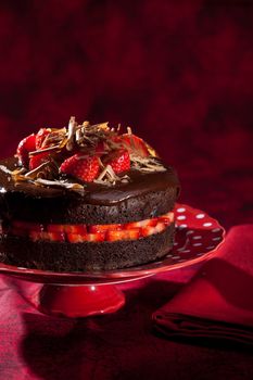 Delicious chocolate strawberry cake with chocolate ganache