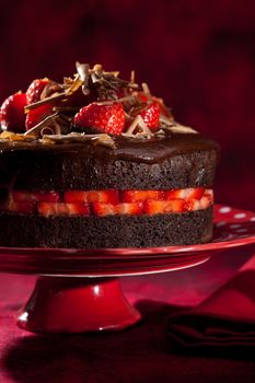 Delicious chocolate strawberry cake with chocolate ganache