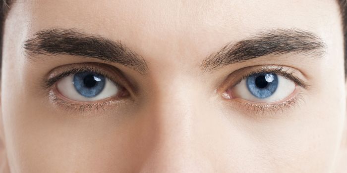 Close-up picture of blue eyes from a young man